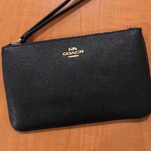 Brand new never used Coach wristlet black